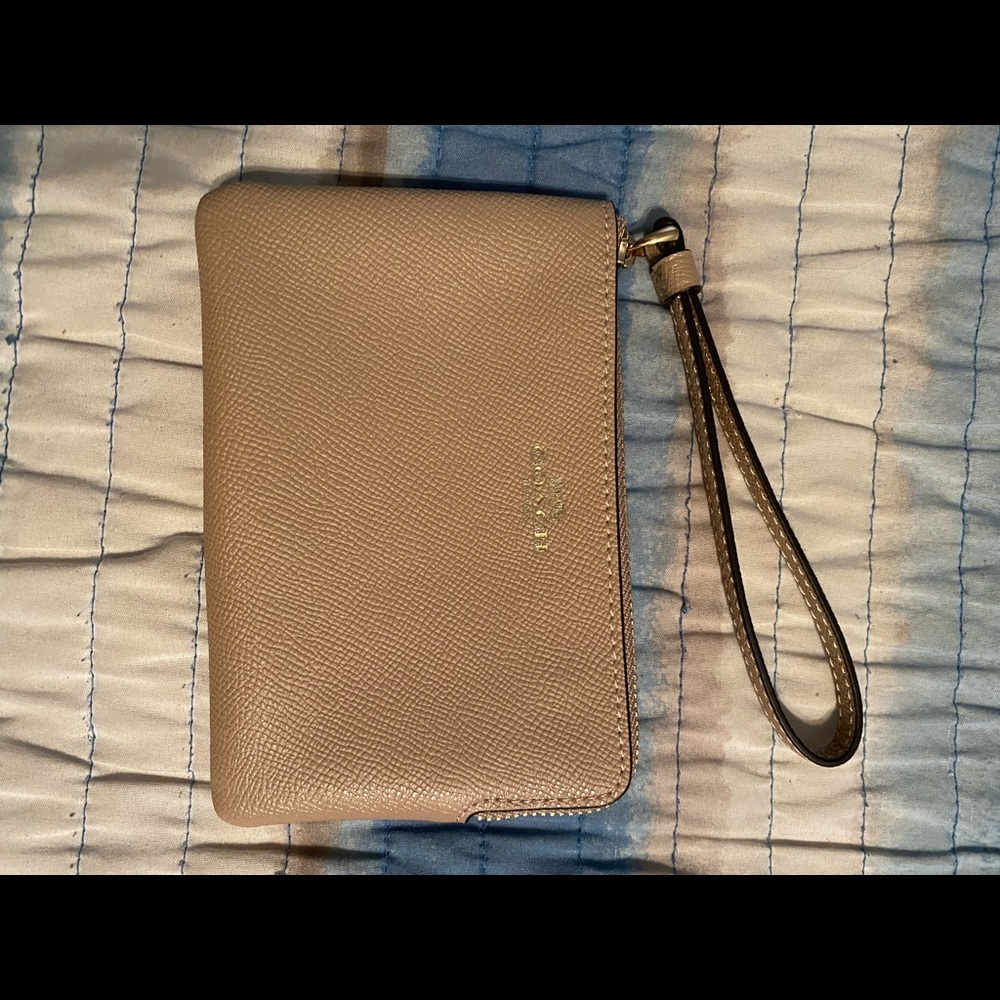 Coach corner zip wristlet. Brand new never used.